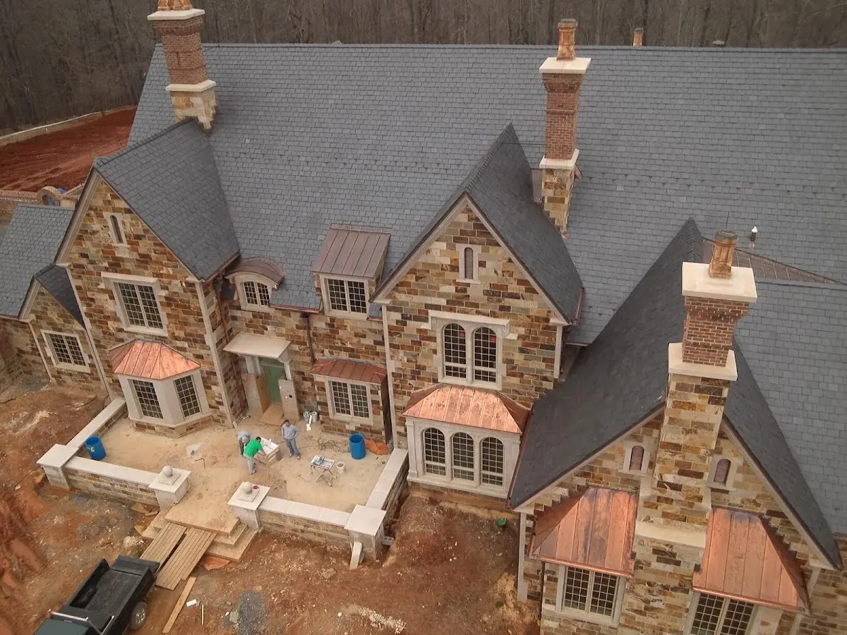 Craftsman Roofing Gutter Guard Installation project in Mons